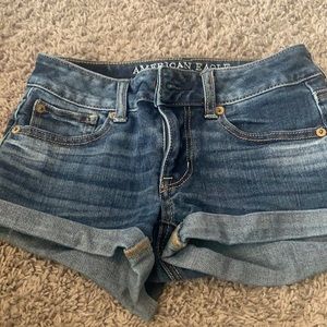 Medium to dark wash denim shorts